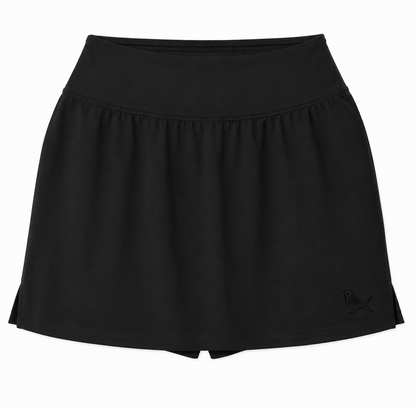 Approach Skort in Black with tonal bird logo, product mockup | Iron Muse Golf