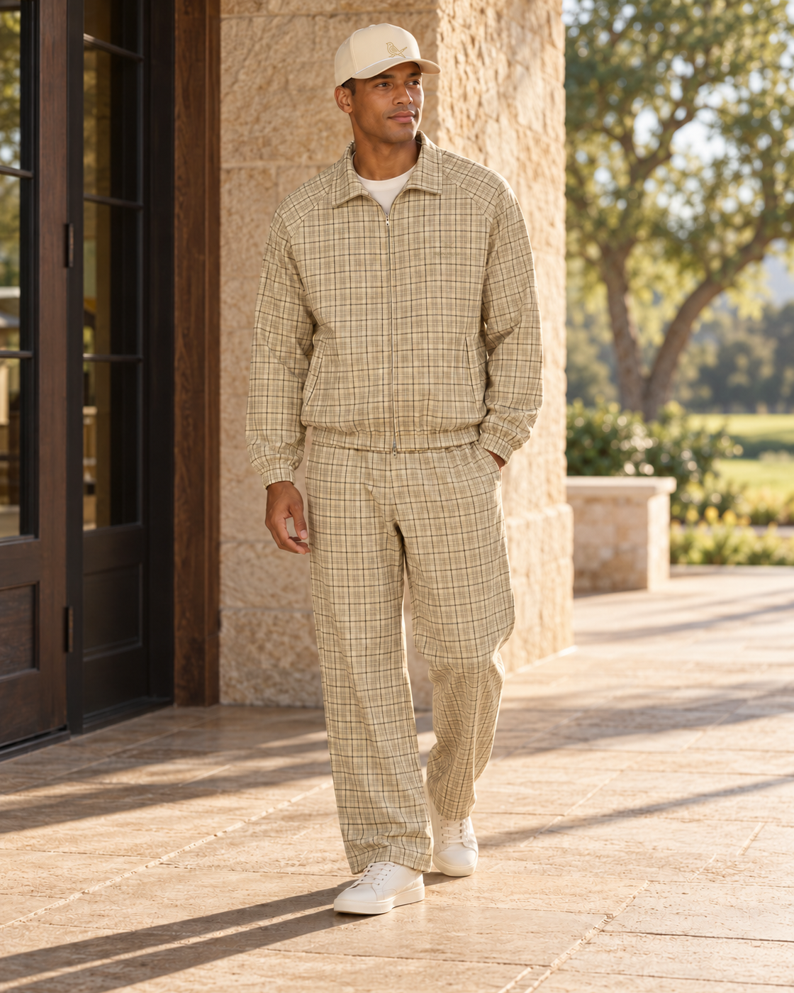 Keep it in the club: model wearing Apricot Plaid Clubhouse Plaid Jacket, Apricot Plaid Clubhouse Plaid Pant, Ivory Heritage Rope.